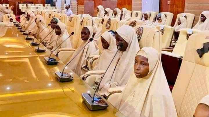 The released students and teacher at the Zamfara Government House