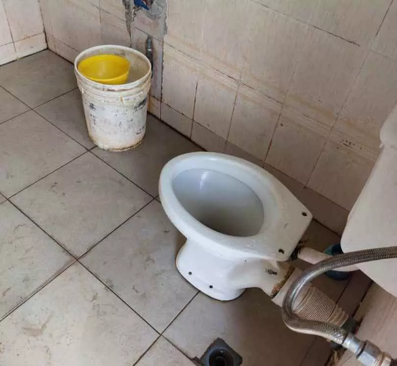 A stenchy toilet at the FCT High Court, Apo.