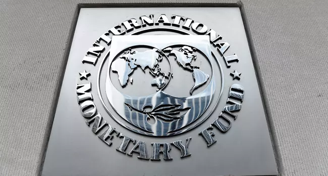 In this file photo an exterior view of the building of the International Monetary Fund (IMF), with the IMG logo, is seen on March 27, 2020 in Washington, DC. Olivier DOULIERY / AFP